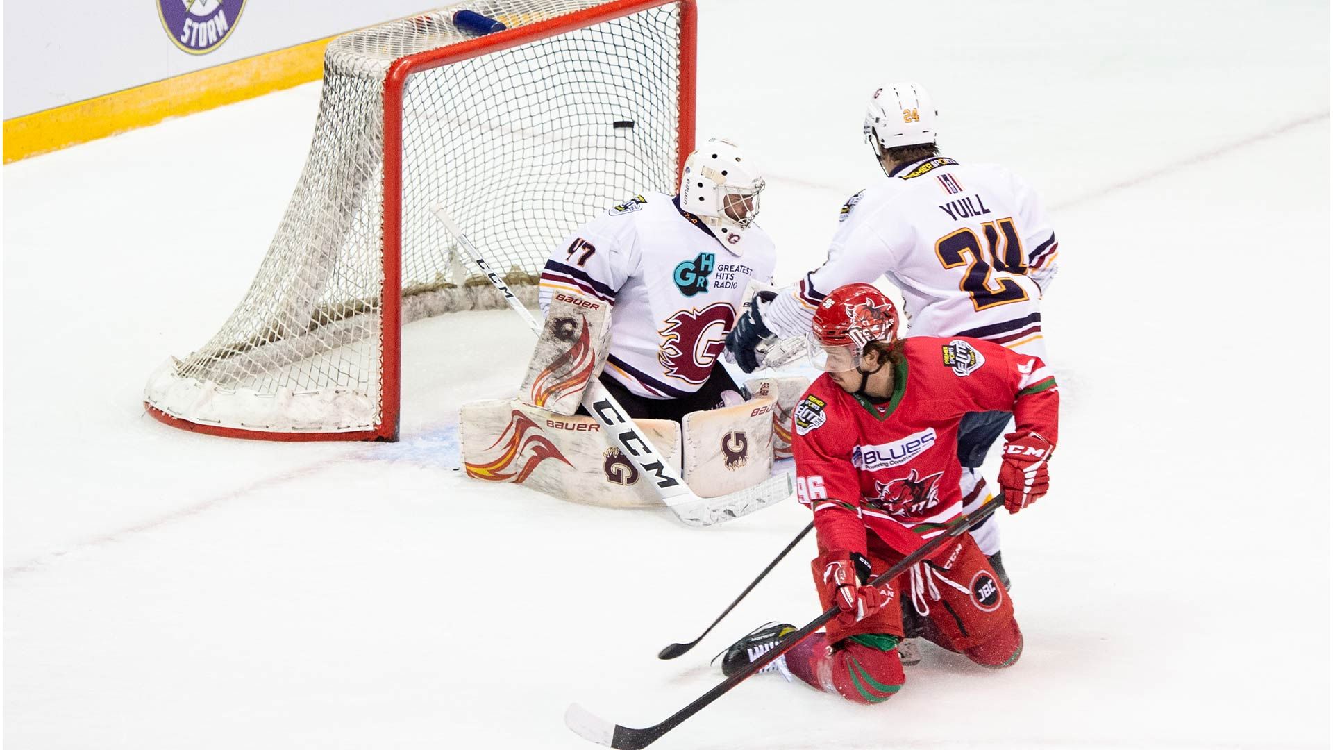 (HC Brodie Dupont) Cole Sandford scored from his knees to give the Cardiff Devils a 2-0 lead over the Guildford Flames in the Elite League Playoff Semi-Finals (Image: James Assinder)