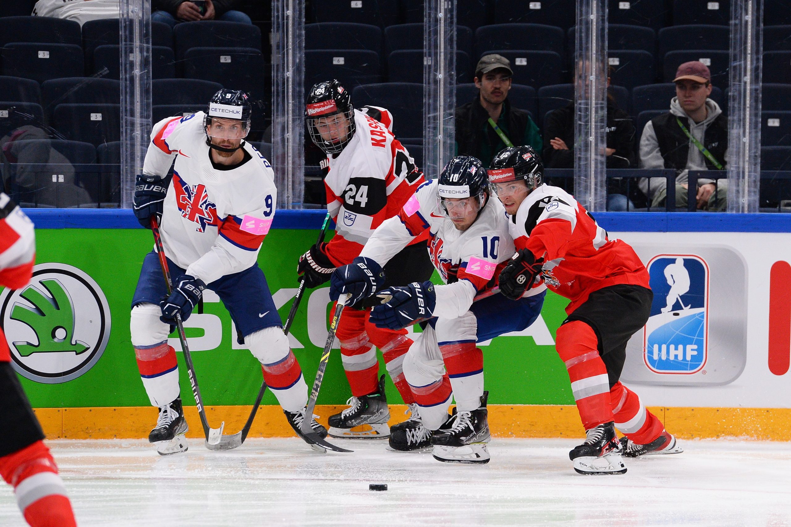 2022 NHL Entry Draft prospect Marco Kasper (centre) played a starring role for Austria at this year's World Championship (Image: Dean Woolley)